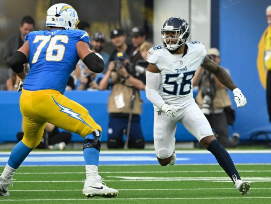 Nov 10, 2024; Inglewood, California, USA; Tennessee Titans linebacker Harold Landry III (58) and Los Angeles Chargers offensive tackle Joe Alt (76) during the third quarter at SoFi Stadium. Mandatory Credit: Robert Hanashiro-Imagn Images