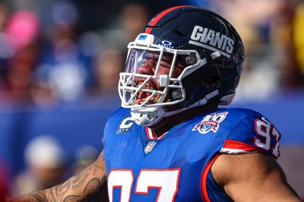 Nov 3, 2024; East Rutherford, New Jersey, USA; New York Giants defensive tackle Dexter Lawrence II (97) reacts during introductions before the game against the Washington Commanders at MetLife Stadium. Mandatory Credit: Vincent Carchietta-Imagn Images