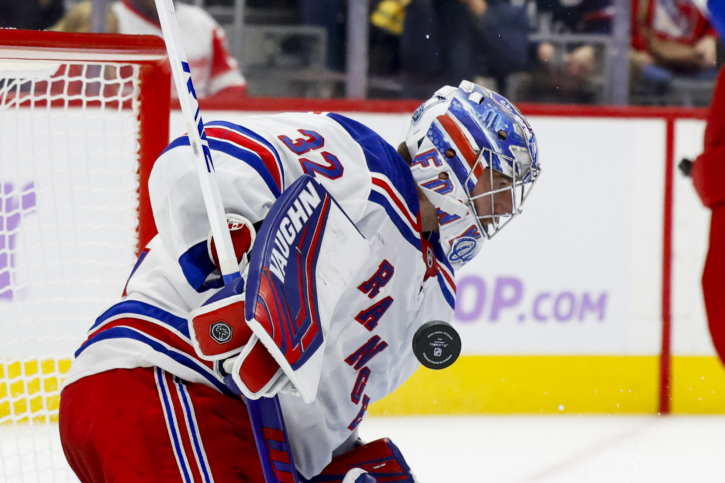 Nov 9, 2024; Detroit, Michigan, USA;  New York Rangers goaltender Jonathan Quick (32) makes a save against the Detroit Red Wings in the second period at Little Caesars Arena. Mandatory Credit: Rick Osentoski-Imagn Images