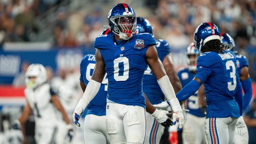 Sep 26, 2024; East Rutherford, NJ, US; New York Giants linebacker Brian Burns (0) looks at his sideline for instructions at MetLife Stadium. Mandatory Credit: Julian Guadalupe-NorthJersey.com