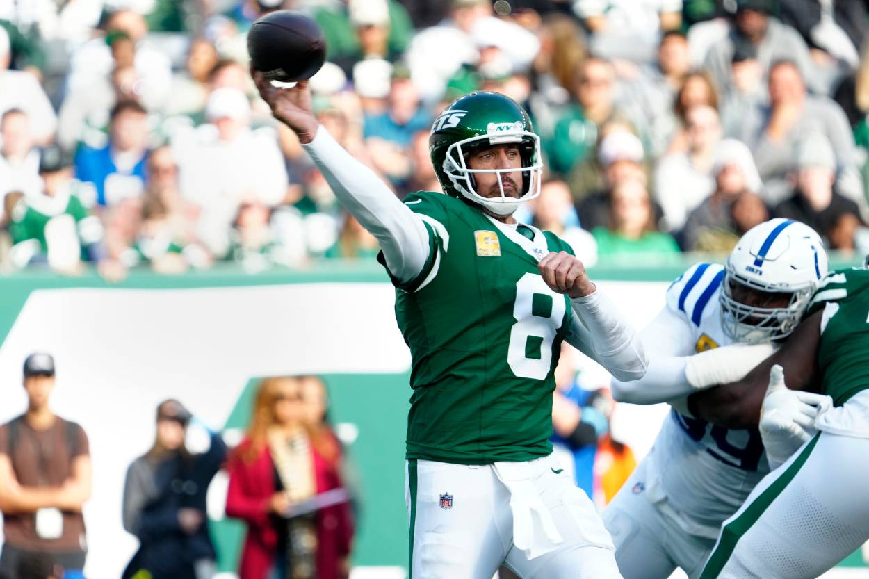 New York Jets quarterback Aaron Rodgers (8) throws the ball during the second quarter, Sunday, November 17, 2024, in East Rutherford.