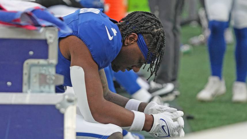 East Rutherford, NJ -- November 24, 2024 -- Malik Nabers of the Giants on the bench late in the fourth quarter as the Tampa Bay Buccaneers came to MetLife Stadium and defeated the New York Giants 30-7.