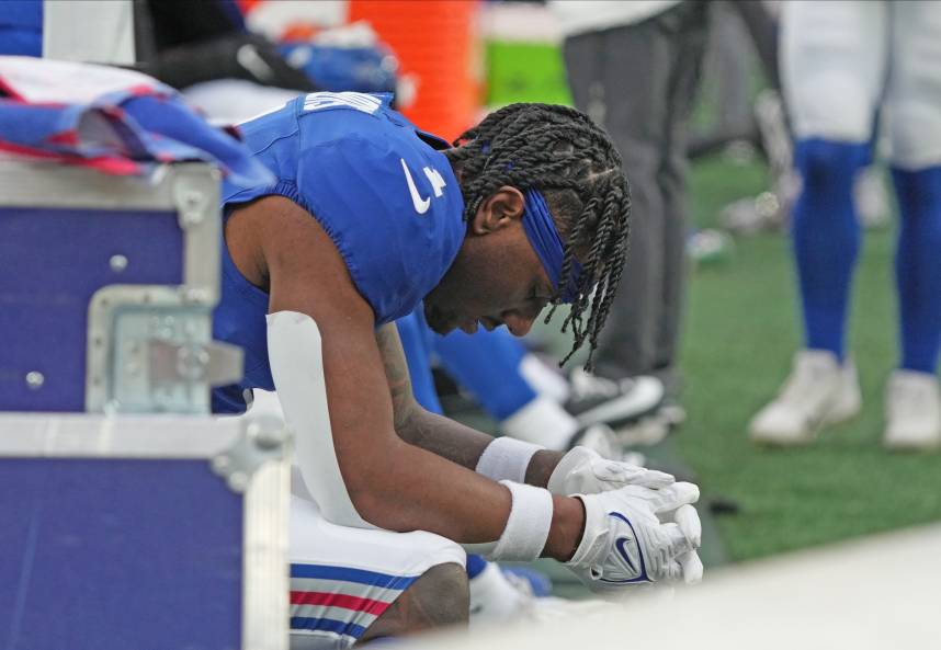 East Rutherford, NJ -- November 24, 2024 -- Malik Nabers of the Giants on the bench late in the fourth quarter as the Tampa Bay Buccaneers came to MetLife Stadium and defeated the New York Giants 30-7.