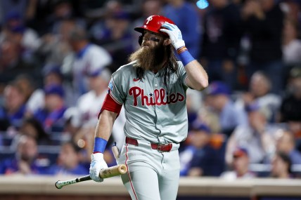 Oct 8, 2024; New York City, New York, USA; Philadelphia Phillies outfielder Brandon Marsh (16) reacts to striking out in the eighth inning against the New York Mets during game three of the NLDS for the 2024 MLB Playoffs at Citi Field. Mandatory Credit: Vincent Carchietta-Imagn Images