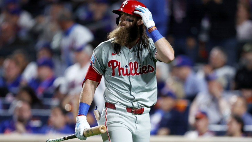 Oct 8, 2024; New York City, New York, USA; Philadelphia Phillies outfielder Brandon Marsh (16) reacts to striking out in the eighth inning against the New York Mets during game three of the NLDS for the 2024 MLB Playoffs at Citi Field. Mandatory Credit: Vincent Carchietta-Imagn Images