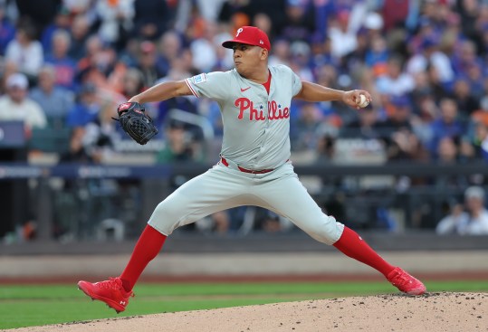 Oct 9, 2024; New York, New York, USA;  Philadelphia Phillies pitcher Ranger Suarez (55) throws a pitch against the New York Mets in the first inning in game four of the NLDS for the 2024 MLB Playoffs at Citi Field. Mandatory Credit: Brad Penner-Imagn Images