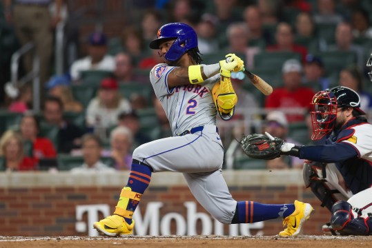 Sep 24, 2024; Atlanta, Georgia, USA; New York Mets shortstop Luisangel Acuna (2) hits a single against the Atlanta Braves in the eighth inning at Truist Park. Mandatory Credit: Brett Davis-Imagn Images