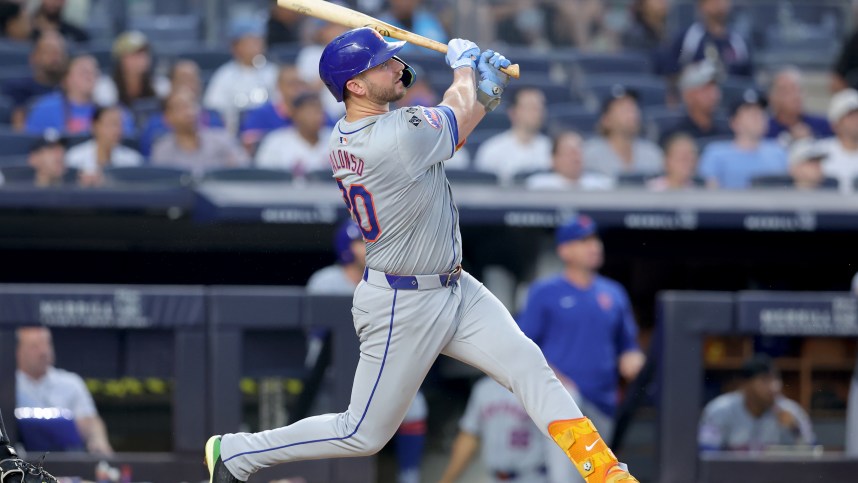 Jul 24, 2024; Bronx, New York, USA; New York Mets first baseman Pete Alonso (20) follows through on a two run home run against the New York Yankees during the fourth inning at Yankee Stadium. Mandatory Credit: Brad Penner-Imagn Images