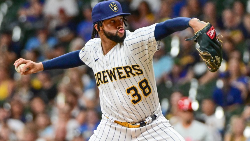 Sep 2, 2023; Milwaukee, Wisconsin, USA; Milwaukee Brewers pitcher Devin Williams (38) pitches against the Philadelphia Phillies in the ninth inning at American Family Field. Mandatory Credit: Benny Sieu-Imagn Images