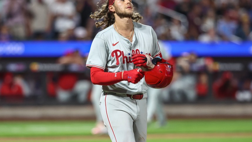 Sep 19, 2024; New York City, New York, USA;  Philadelphia Phillies third baseman Alec Bohm (28) reacts after popping out to end the seventh inning against the New York Mets at Citi Field. Mandatory Credit: Wendell Cruz-Imagn Images