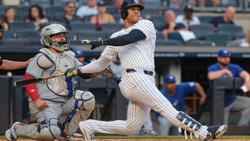 Aug 4, 2024; Bronx, New York, USA; New York Yankees right fielder Juan Soto (22) double during the eighth inning against the Toronto Blue Jays at Yankee Stadium. Mandatory Credit: Vincent Carchietta-Imagn Images