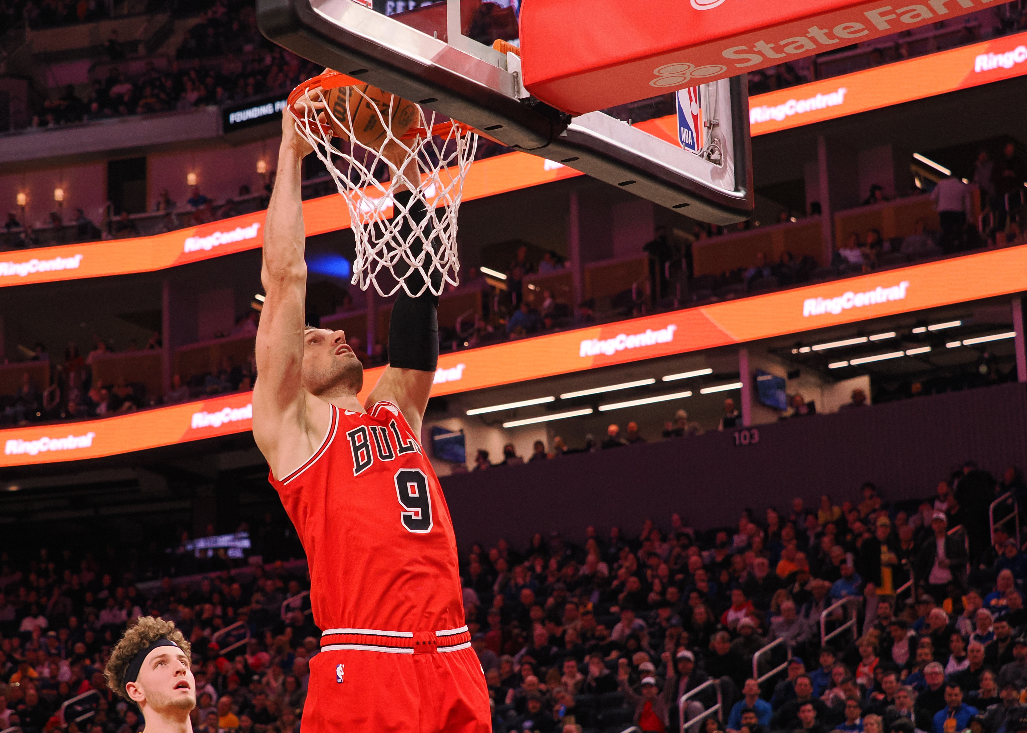 Mar 7, 2024; San Francisco, California, USA; Chicago Bulls center Nikola Vucevic (9) dunks the ball against the Golden State Warriors during the third quarter at Chase Center. Mandatory Credit: Kelley L Cox-Imagn Images