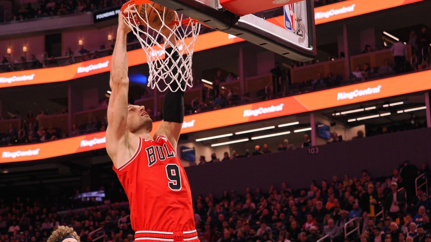 Mar 7, 2024; San Francisco, California, USA; Chicago Bulls center Nikola Vucevic (9) dunks the ball against the Golden State Warriors during the third quarter at Chase Center. Mandatory Credit: Kelley L Cox-Imagn Images