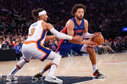 Dec 7, 2024; New York, New York, USA; Detroit Pistons guard Cade Cunningham (2) is defended by New York Knicks guard Josh Hart (3) during the first half at Madison Square Garden. Mandatory Credit: Vincent Carchietta-Imagn Images