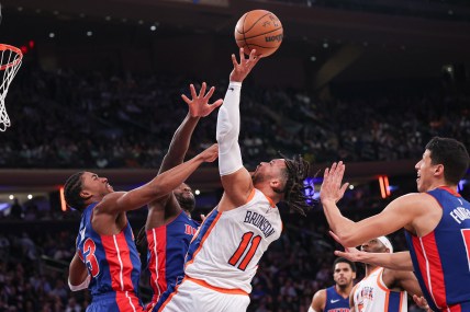 Dec 7, 2024; New York, New York, USA; New York Knicks guard Jalen Brunson (11) shoots the ball as Detroit Pistons guard Jaden Ivey (23) defends during the second half at Madison Square Garden. Mandatory Credit: Vincent Carchietta-Imagn Images