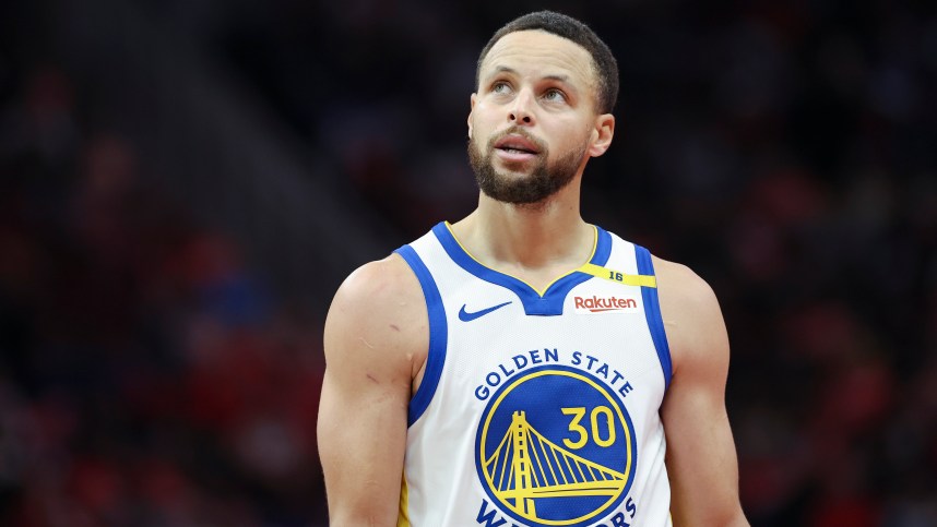 Dec 11, 2024; Houston, Texas, USA; Golden State Warriors guard Stephen Curry (30) looks up after a play during the fourth quarter against the Houston Rockets at Toyota Center. Mandatory Credit: Troy Taormina-Imagn Images