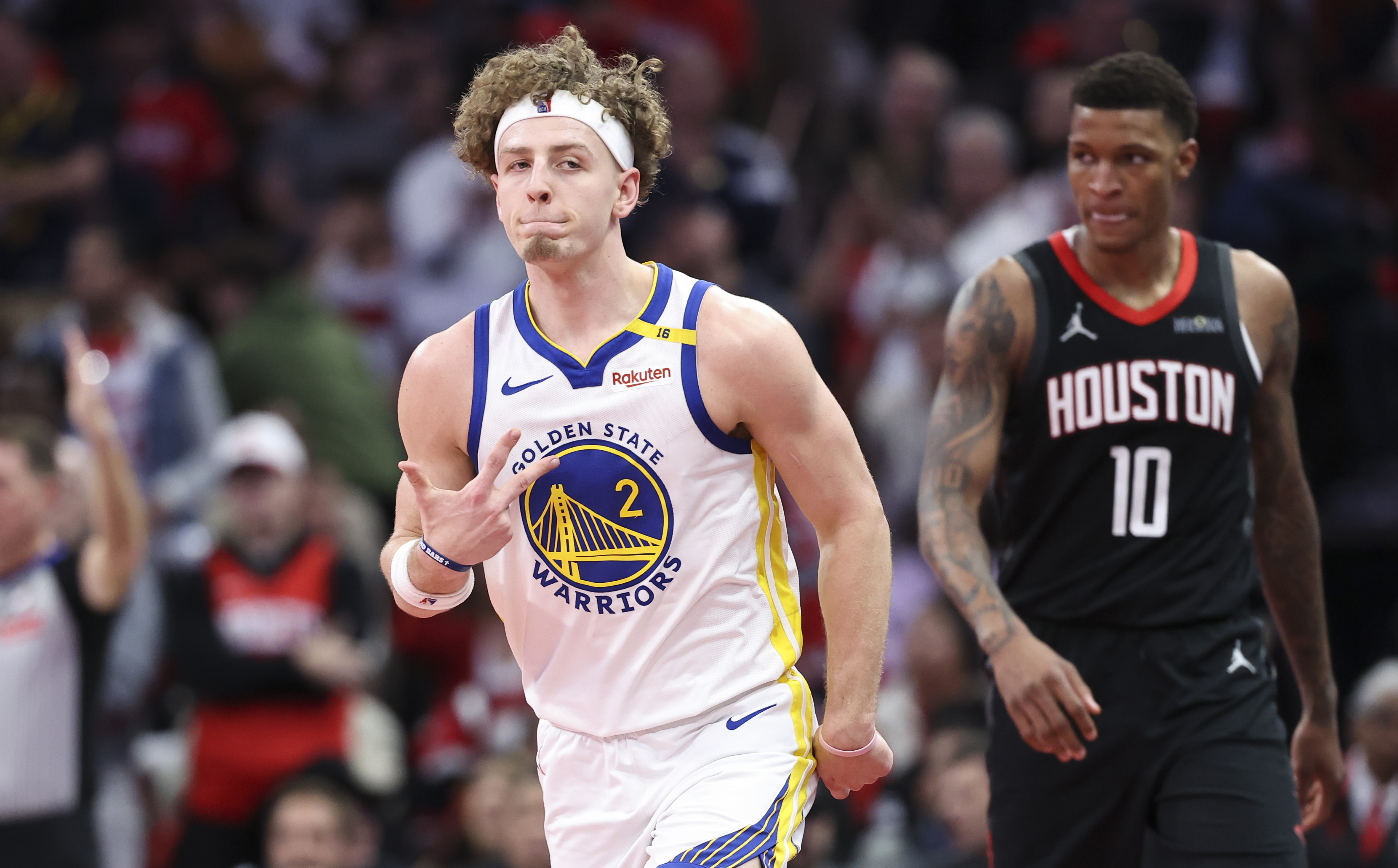 Dec 11, 2024; Houston, Texas, USA; Golden State Warriors guard Brandin Podziemski (2) reacts after making a basket during the fourth quarter against the Houston Rockets at Toyota Center. Mandatory Credit: Troy Taormina-Imagn Images