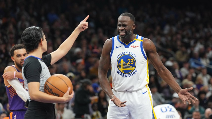 Nov 30, 2024; Phoenix, Arizona, USA; Golden State Warriors forward Draymond Green (23) argues a call during the second half against the Phoenix Suns at Footprint Center. Mandatory Credit: Joe Camporeale-Imagn Images