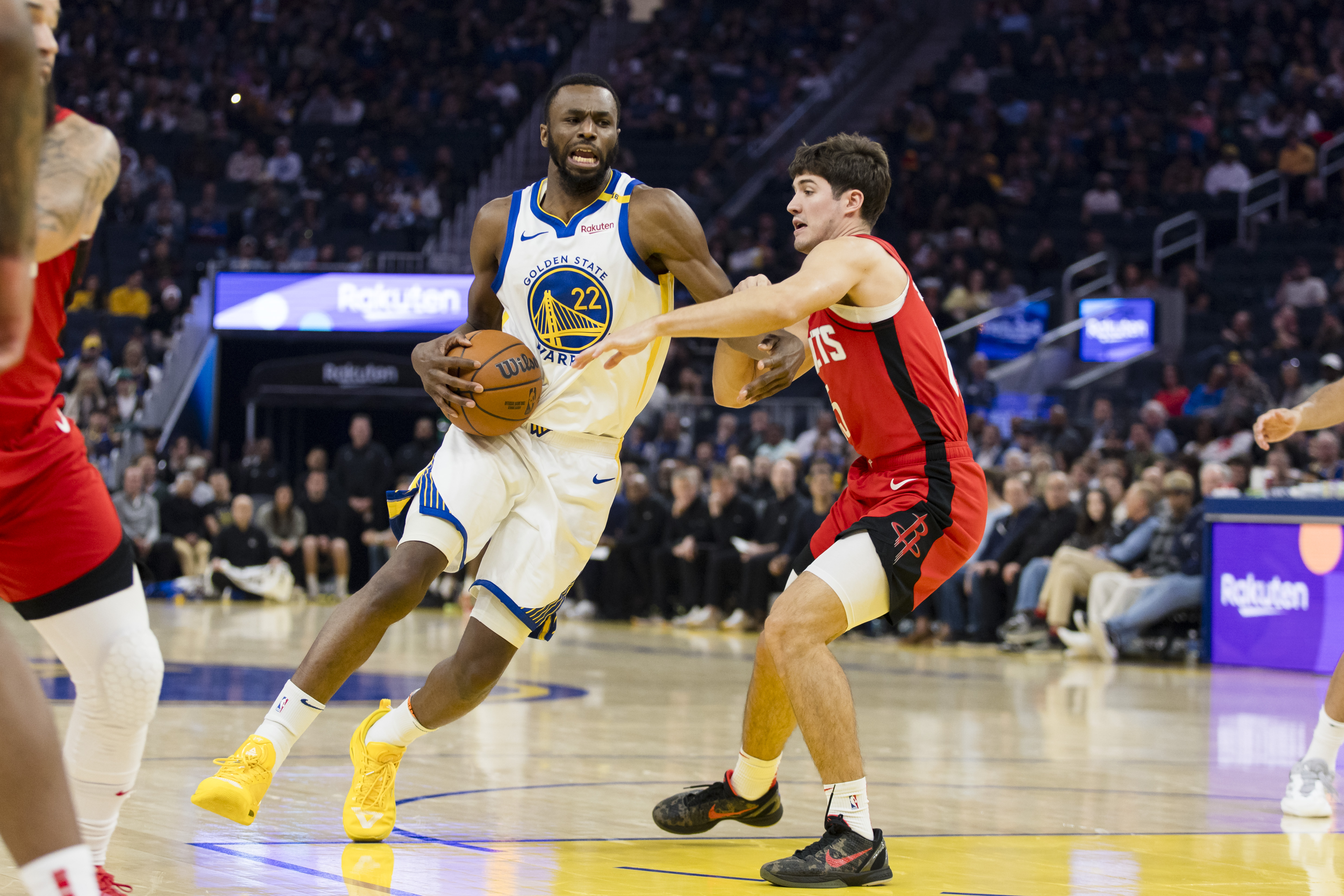 Dec 5, 2024; San Francisco, California, USA;  Houston Rockets guard Reed Sheppard (15) defends against Golden State Warriors forward Andrew Wiggins (22) during the first quarter at Chase Center. Mandatory Credit: John Hefti-Imagn Images