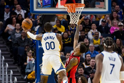 Dec 5, 2024; San Francisco, California, USA;  Golden State Warriors forward Jonathan Kuminga (00) shoots against the Houston Rockets during the third quarter at Chase Center. Mandatory Credit: John Hefti-Imagn Images