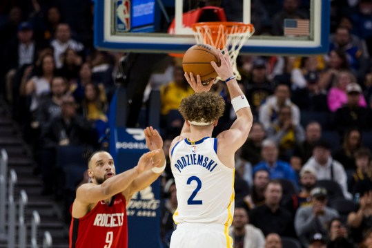 Dec 5, 2024; San Francisco, California, USA;  Golden State Warriors guard Brandin Podziemski (2) takes a three-point shot against the Houston Rockets during the fourth quarter at Chase Center. Mandatory Credit: John Hefti-Imagn Images