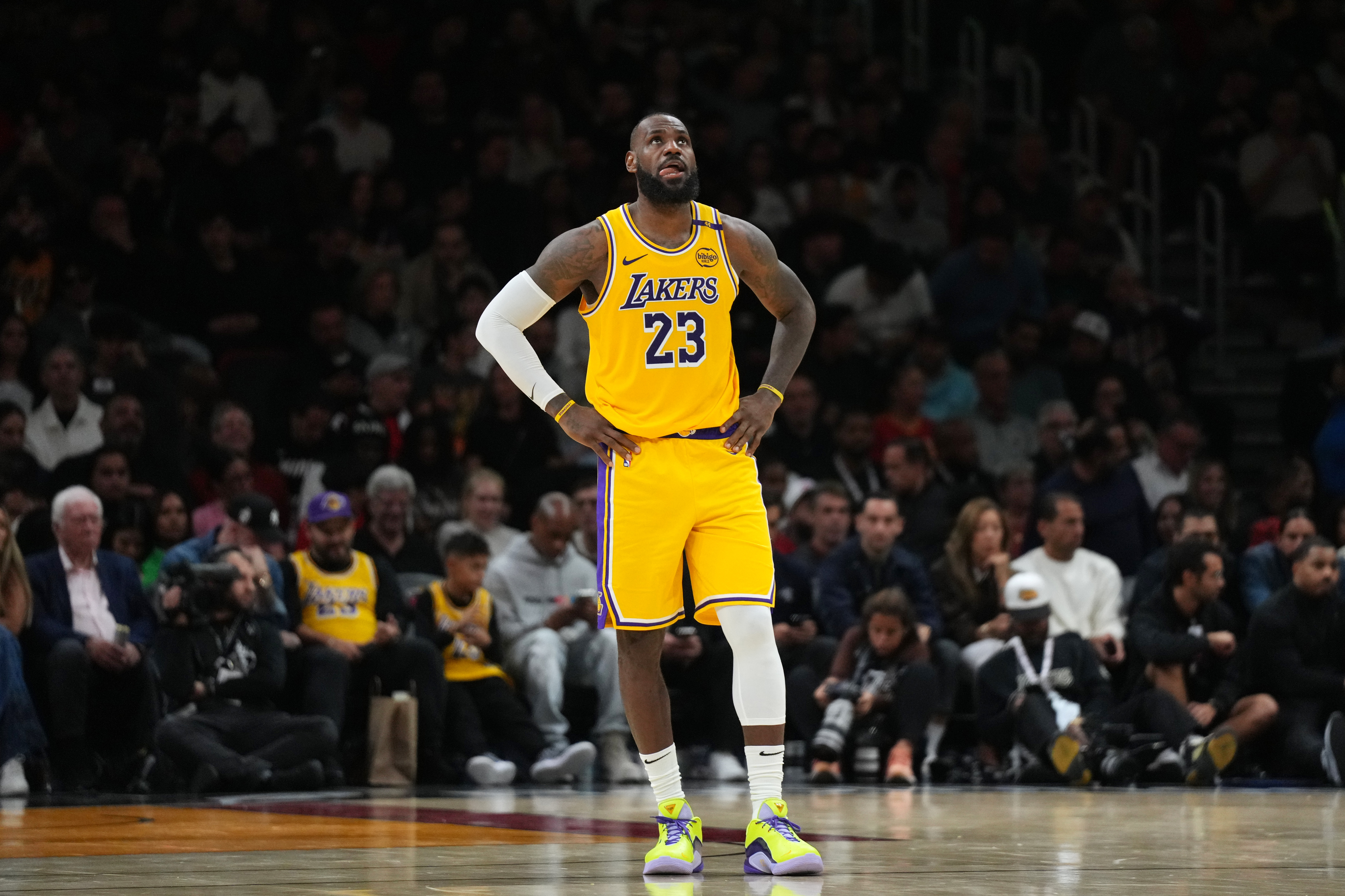 Dec 4, 2024; Miami, Florida, USA;  Los Angeles Lakers forward LeBron James (23) looks up at the scoreboard late in a game against the Miami Heat at Kaseya Center. Mandatory Credit: Jim Rassol-Imagn Images