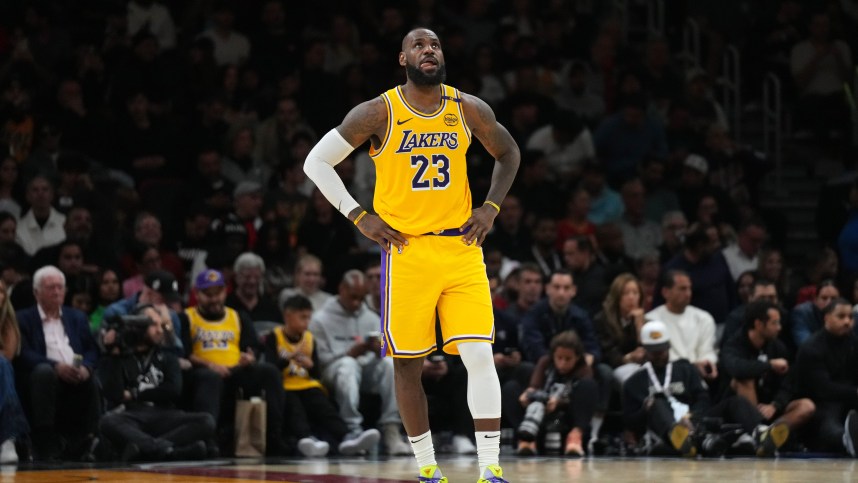 Dec 4, 2024; Miami, Florida, USA;  Los Angeles Lakers forward LeBron James (23) looks up at the scoreboard late in a game against the Miami Heat at Kaseya Center. Mandatory Credit: Jim Rassol-Imagn Images