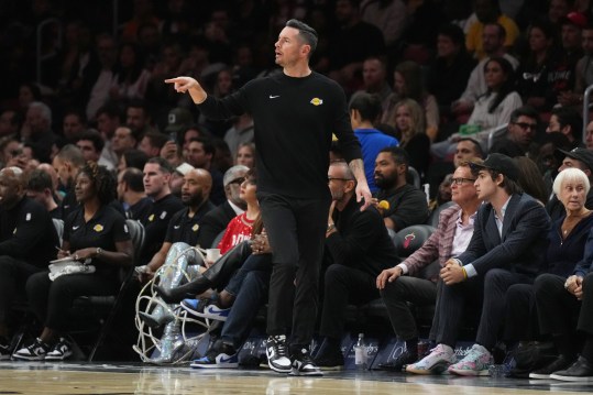 Dec 4, 2024; Miami, Florida, USA; Los Angeles Lakers head coach JJ Redick directs his team against the Miami Heat in the first half at Kaseya Center. Mandatory Credit: Jim Rassol-Imagn Images