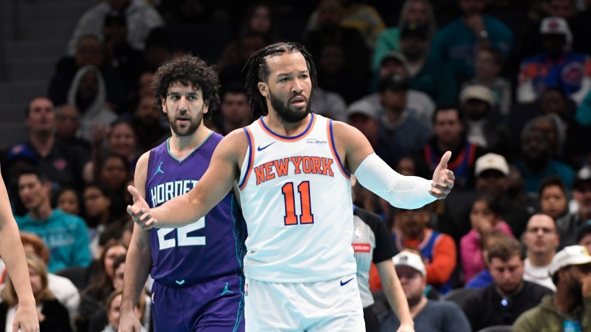 Nov 29, 2024; Charlotte, North Carolina, USA;  New York Knicks guard Jalen Brunson (11) complains about a possible foul during the second half against the Charlotte Hornets at the Spectrum Center. Mandatory Credit: Sam Sharpe-Imagn Images