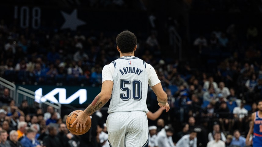 Dec 15, 2024; Orlando, Florida, USA; Orlando Magic guard Cole Anthony (50) dribbles the ball against the New York Knicks in the second quarter  at Kia Center. Mandatory Credit: Jeremy Reper-Imagn Images