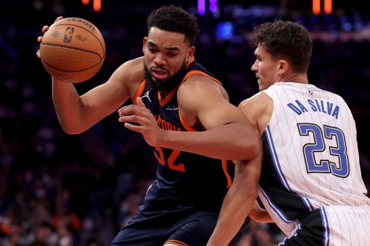 Dec 3, 2024; New York, New York, USA; New York Knicks center Karl-Anthony Towns (32) controls the ball against Orlando Magic forward Tristan da Silva (23) during the third quarter at Madison Square Garden. Mandatory Credit: Brad Penner-Imagn Images