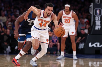 Oct 13, 2024; New York, New York, USA; New York Knicks guard Landry Shamet (44) steals the ball from Minnesota Timberwolves guard Anthony Edwards (5) during the first half at Madison Square Garden. Mandatory Credit: Vincent Carchietta-Imagn Images