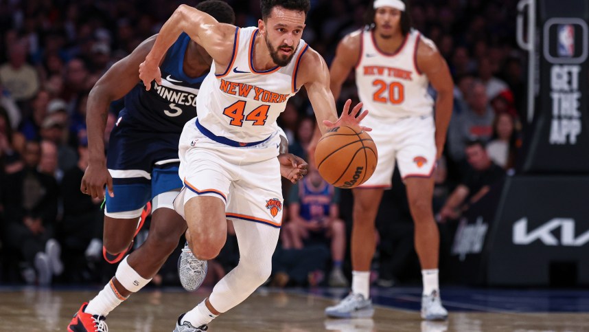 Oct 13, 2024; New York, New York, USA; New York Knicks guard Landry Shamet (44) steals the ball from Minnesota Timberwolves guard Anthony Edwards (5) during the first half at Madison Square Garden. Mandatory Credit: Vincent Carchietta-Imagn Images