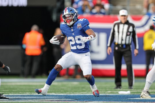 Dec 29, 2024; East Rutherford, New Jersey, USA; New York Giants running back Tyrone Tracy Jr. (29) carries the ball during the first half against the Indianapolis Colts at MetLife Stadium. Mandatory Credit: Vincent Carchietta-Imagn Images