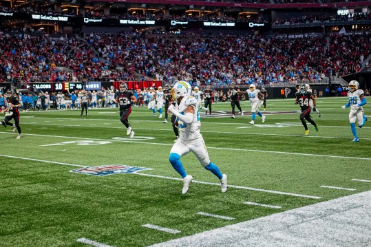 Dec 1, 2024; Atlanta, Georgia, USA; Los Angeles Chargers cornerback Tarheeb Still (29) returns an interception for a touchdown against the Atlanta Falcons during the second half at Mercedes-Benz Stadium. Mandatory Credit: Dale Zanine-Imagn Images