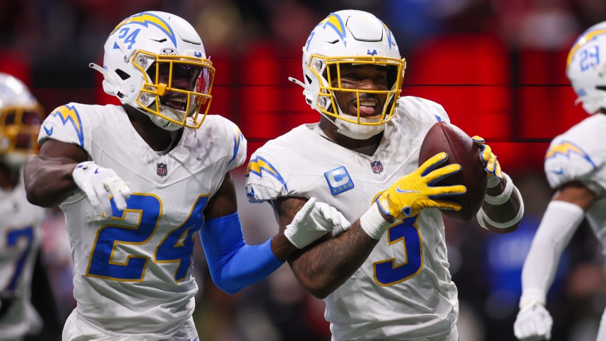 Dec 1, 2024; Atlanta, Georgia, USA; Los Angeles Chargers safety Derwin James Jr. (3) celebrates with safety Marcus Maye (24) and cornerback Tarheeb Still (29) after an interception against the Atlanta Falcons in the fourth quarter at Mercedes-Benz Stadium. Mandatory Credit: Brett Davis-Imagn Images