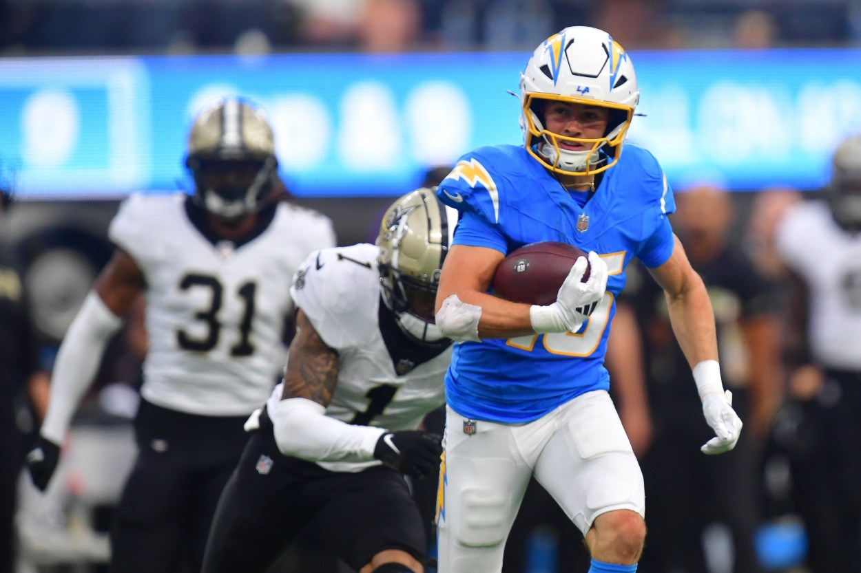 Oct 27, 2024; Inglewood, California, USA; Los Angeles Chargers wide receiver Ladd McConkey (15) runs the ball for a touchdown against the New Orleans Saints during the second half at SoFi Stadium. Mandatory Credit: Gary A. Vasquez-Imagn Images