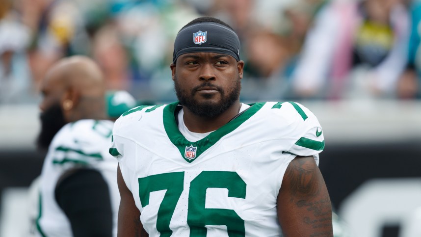 Dec 15, 2024; Jacksonville, Florida, USA; New York Jets offensive linebacker John Simpson (76) before the game against the Jacksonville Jaguars at EverBank Stadium. Mandatory Credit: Morgan Tencza-Imagn Images