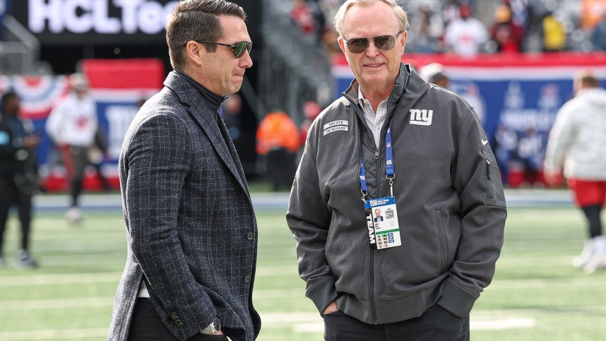 Nov 24, 2024; East Rutherford, New Jersey, USA; New York Giants owner John Mara, left, and New York Giants general manager Joe Schoen on the field before the game between the Giants and the Tampa Bay Buccaneers at MetLife Stadium. Mandatory Credit: Vincent Carchietta-Imagn Images