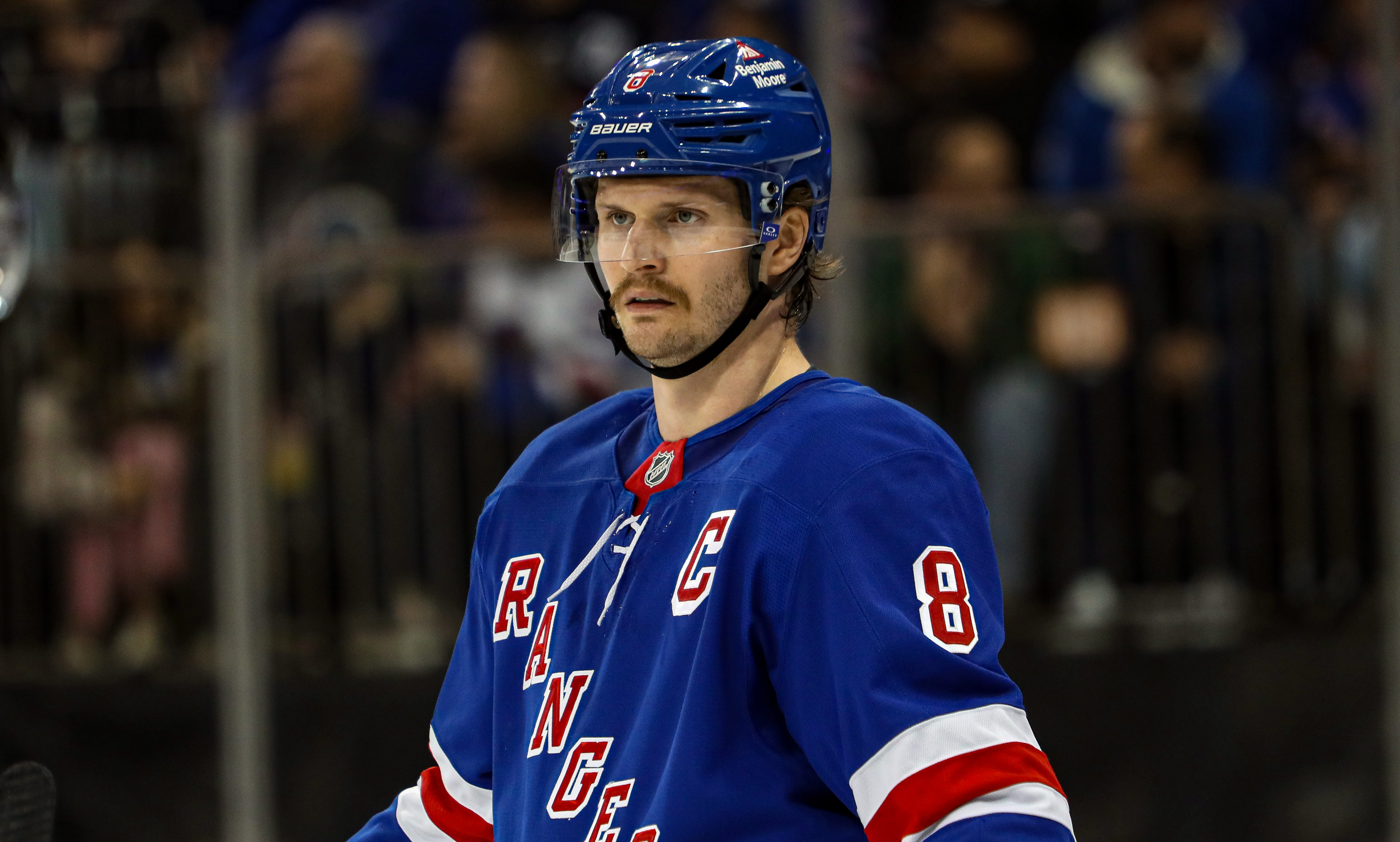 Nov 25, 2024; New York, New York, USA; New York Rangers defenseman Jacob Trouba (8) skates against the St. Louis Blues during the first period at Madison Square Garden. Mandatory Credit: Danny Wild-Imagn Images