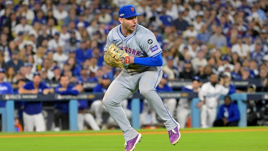 Oct 20, 2024; Los Angeles, California, USA; New York Mets first baseman Pete Alonso (20) fields the ball hit by Los Angeles Dodgers second baseman Chris Taylor (not pictured) in the sixth inning during game six of the NLCS for the 2024 MLB playoffs at Dodger Stadium. Mandatory Credit: Jayne Kamin-Oncea-Imagn Images