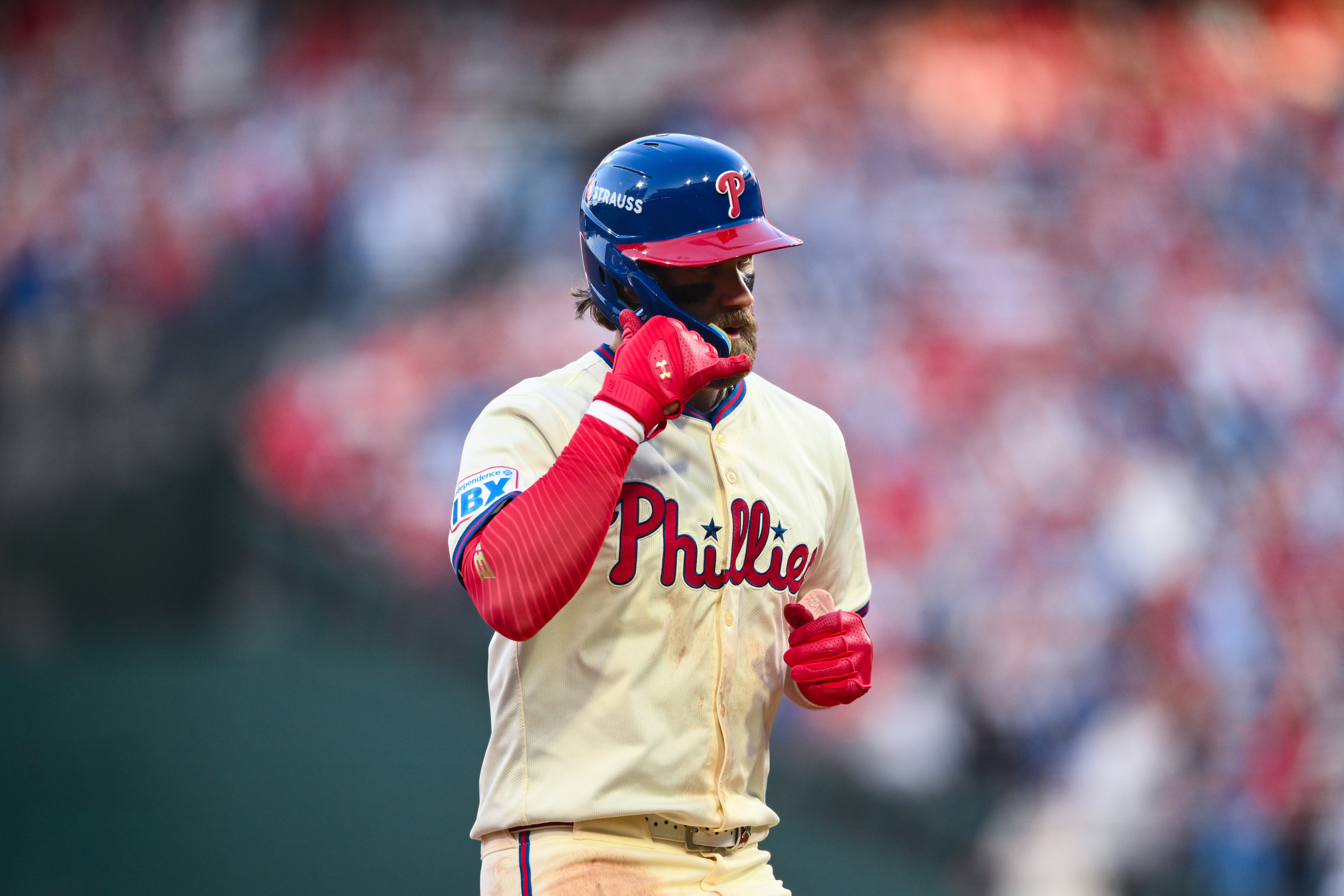 Oct 6, 2024; Philadelphia, Pennsylvania, USA; Philadelphia Phillies first baseman Bryce Harper (3) reacts after hitting a two-run home run against the New York Mets in the sixth inning during game two of the NLDS for the 2024 MLB Playoffs at Citizens Bank Park. Mandatory Credit: Kyle Ross-Imagn Images