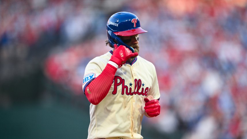 Oct 6, 2024; Philadelphia, Pennsylvania, USA; Philadelphia Phillies first baseman Bryce Harper (3) reacts after hitting a two-run home run against the New York Mets in the sixth inning during game two of the NLDS for the 2024 MLB Playoffs at Citizens Bank Park. Mandatory Credit: Kyle Ross-Imagn Images