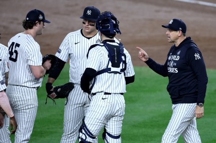 Oct 30, 2024; New York, New York, USA; New York Yankees manager Aaron Boone (17) makes a pitching change taking out pitcher Gerrit Cole (45) during the seventh inning against the Los Angeles Dodgers in game five of the 2024 MLB World Series at Yankee Stadium. Mandatory Credit: Wendell Cruz-Imagn Images