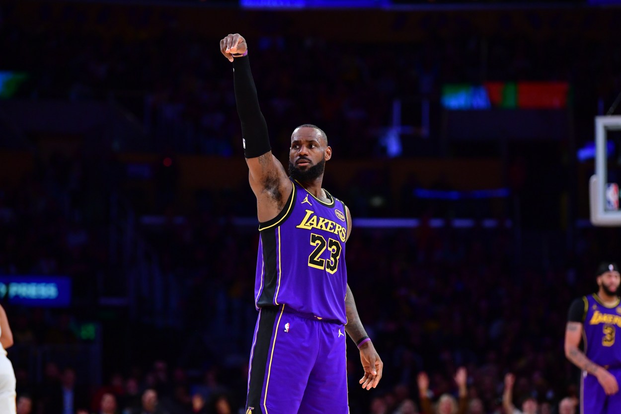 Jan 3, 2025; Los Angeles, California, USA;  Los Angeles Lakers forward LeBron James (23) reacts after scoring three point basket against the Atlanta Hawks during the second half at Crypto.com Arena. Mandatory Credit: Gary A. Vasquez-Imagn Images