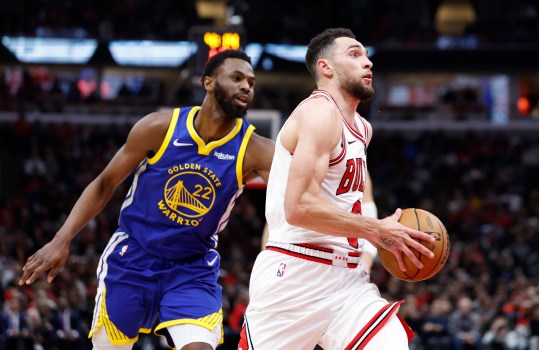 Jan 12, 2024; Chicago, Illinois, USA; Chicago Bulls guard Zach LaVine (8) drives against Golden State Warriors forward Andrew Wiggins (22) during the second half at United Center. Mandatory Credit: Kamil Krzaczynski-Imagn Images