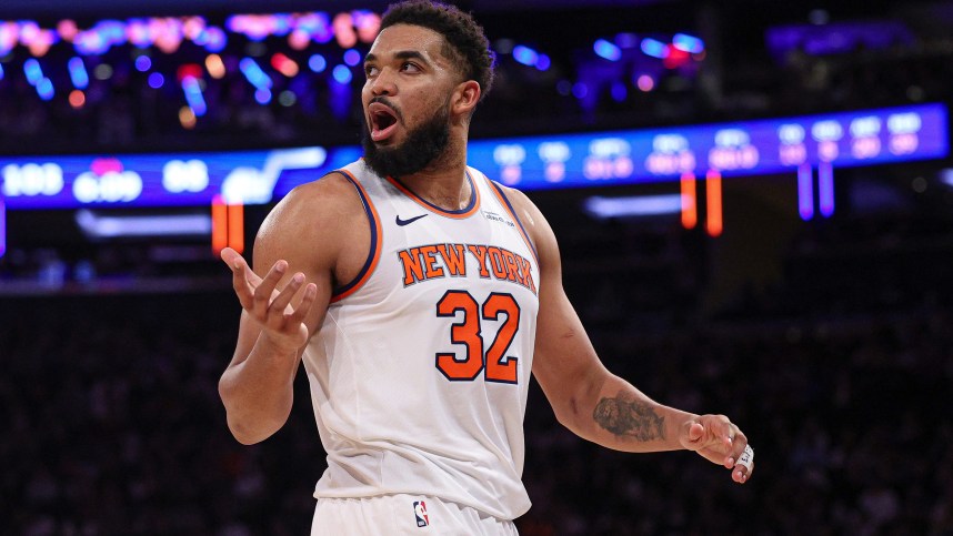 Jan 1, 2025; New York, New York, USA; New York Knicks center Karl-Anthony Towns (32) reacts during the second half against the Utah Jazz at Madison Square Garden. Mandatory Credit: Vincent Carchietta-Imagn Images