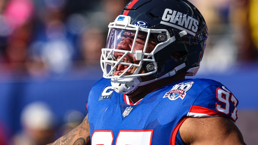 Nov 3, 2024; East Rutherford, New Jersey, USA; New York Giants defensive tackle Dexter Lawrence II (97) reacts during introductions before the game against the Washington Commanders at MetLife Stadium. Mandatory Credit: Vincent Carchietta-Imagn Images