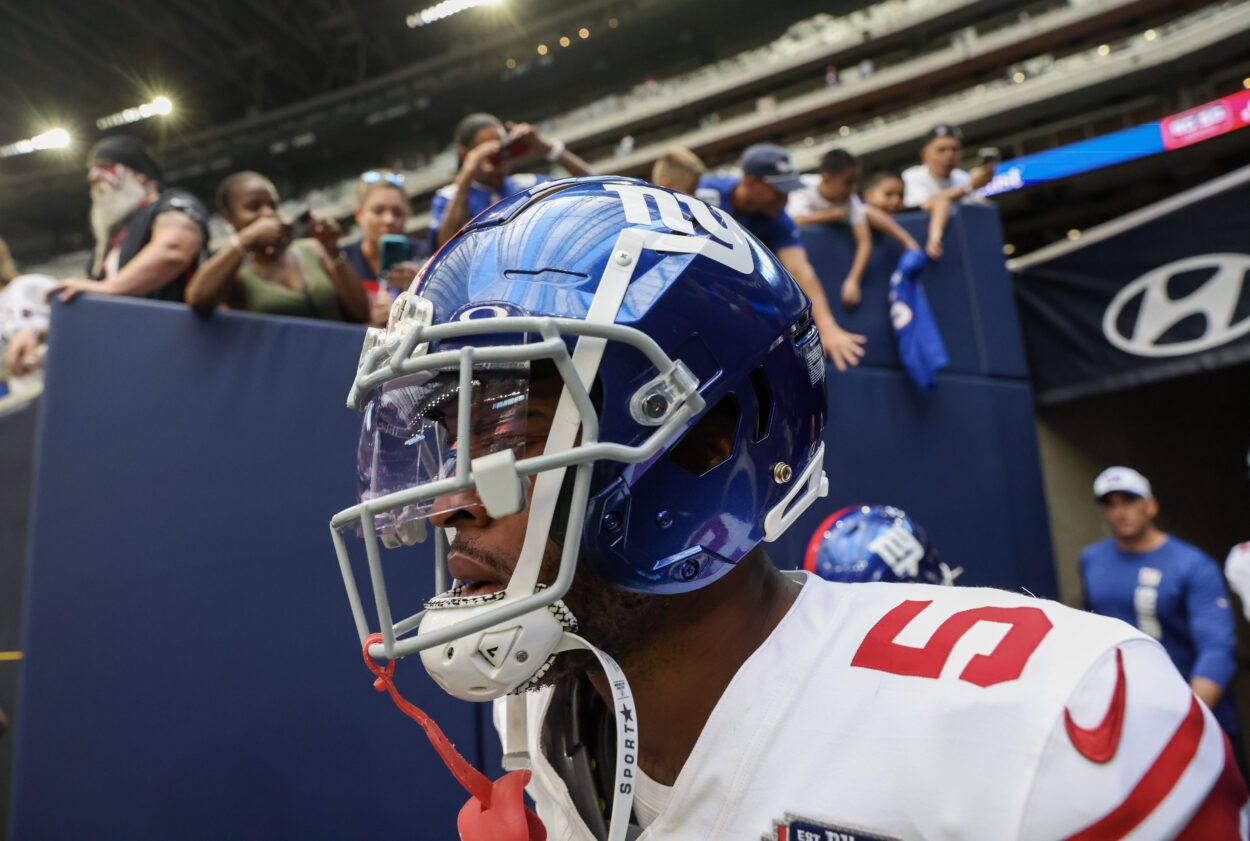 Aug 17, 2024; Houston, Texas, USA;  New York Giants wide receiver Allen Robinson II (5) and teammates run onto the field before playing against the Houston Texans at NRG Stadium. Mandatory Credit: Thomas Shea-Imagn Images