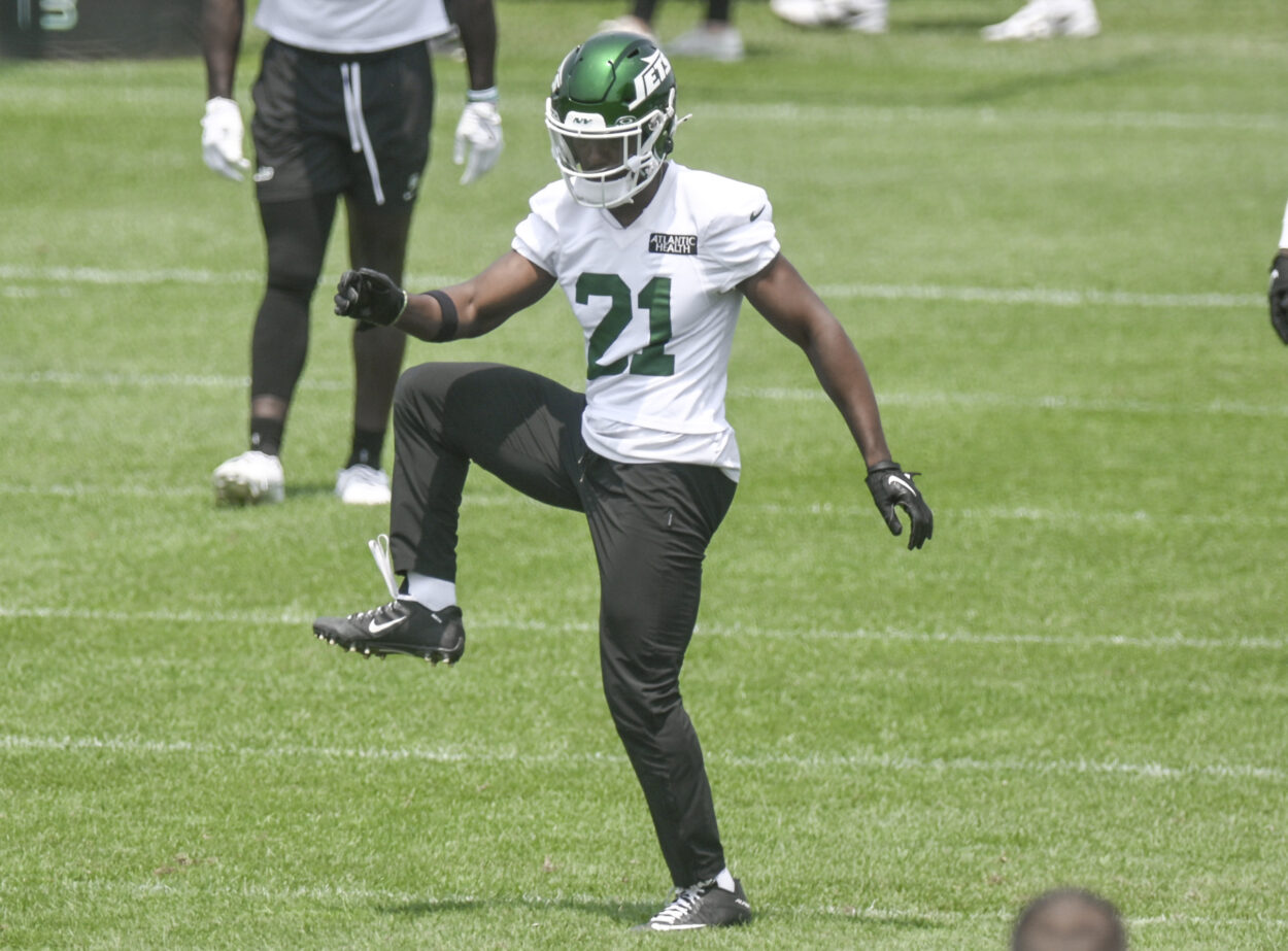 Jun 11, 2025; Florham Park, NY, USA; New York Jets cornerback Brandon Stephens (21) warms up during minicamp at Atlantic Health Jets Training Center. Mandatory Credit: John Jones-Imagn Images